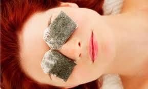 cold tea bags covering the eyes
